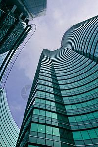 商业摩天大楼金融玻璃蓝色市中心中心天空建筑公司办公室反射背景图片