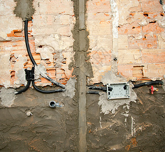 厨房工程中的电气和管道安装及水管安装盒子石头维修砖墙建筑石工拼装导管房子工作背景图片
