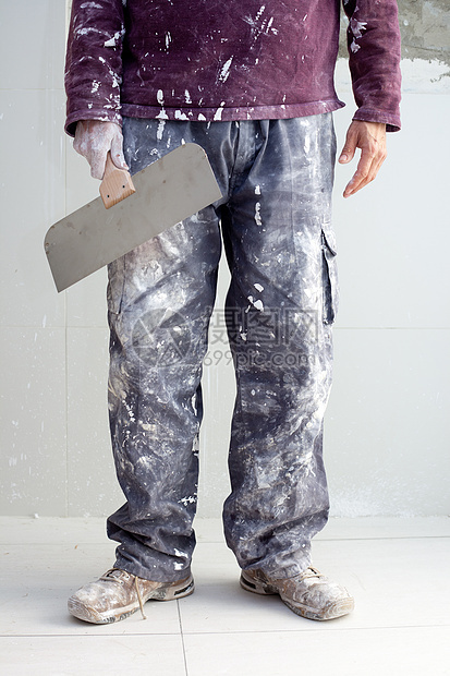 建筑石膏工泥匠脏裤子犯规工作砂浆就业手工拼装男人水泥画家房子图片