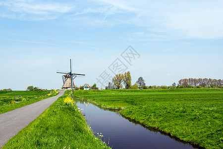 荷兰风车 荷兰纪念碑蓝色天空车轮翅膀水车建筑学车削纺纱历史性图片