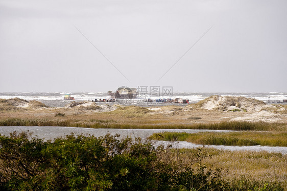 暴风暴洪水海浪沙丘建筑断路器暴风雨天气糕点地平线灯光波浪图片