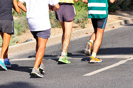 马拉松赛车慢跑者竞赛跑步者短跑人群短裤领导者运动鞋慢跑比赛图片