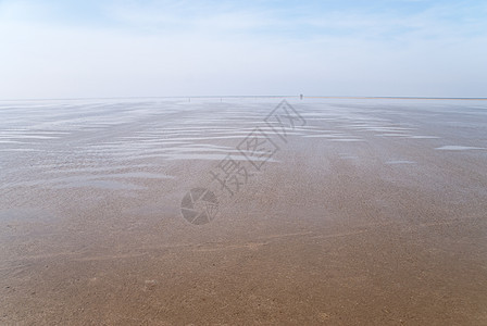 海滩沙滩季节泥滩天空海岸地平线图片