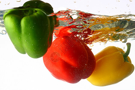 螺旋喷洒辣椒农场蔬菜红辣椒沙拉橙子香料水果食物胡椒图片