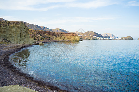 孤单海滩火山水平岩石海岸自然公园村庄图片
