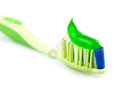 与隔离的绿牙膏同牙刷图片