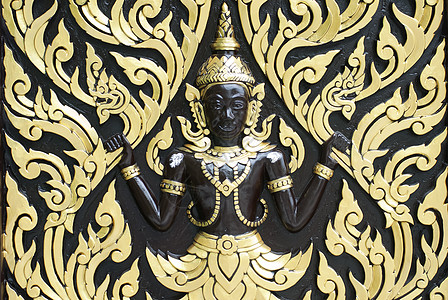 泰国墙雕塑背景图片