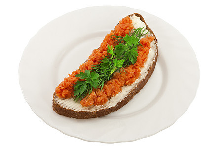 盘子里有鲑鱼三明治叶子蔬菜营养早餐午餐点心食物黄油小吃青菜图片