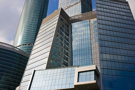 摩天大楼商业财产金融建筑学中心玻璃市中心城市民众晴天图片