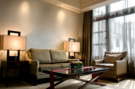 5星豪华酒店套房的座椅面积墙纸沙发桌子玻璃木头旅行假期边缘房间家具图片