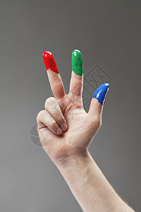 RGB 英镑指甲油绿色手指添加剂蓝色油漆背景图片