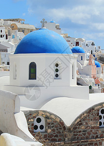 希腊 圣托里尼 正统教堂蓝丘陵火山口建筑村庄天空天炉悬崖教会圆顶海洋宗教图片