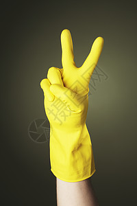 胜利家务手套琐事橡皮手势黄色成功家庭手指图片