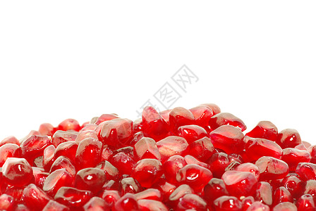 石榴水果白色宏观红色食物背景图片