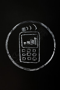 黑板背景移动电话符号的粉笔绘画图纸图片