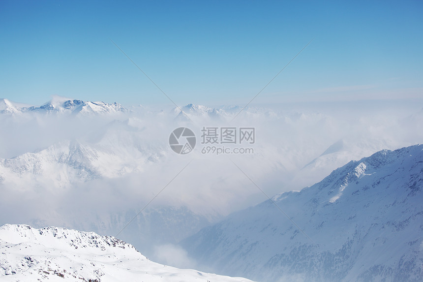 平面顶部高山天空阳光全景太阳滑雪冰川旅行冻结岩石图片