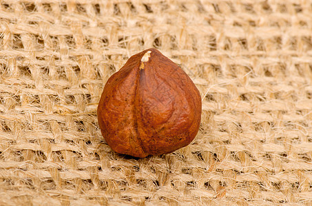 圆滑背景的黑桃栗子小吃核桃坚果宏观榛子松鼠味道白色季节性种子图片