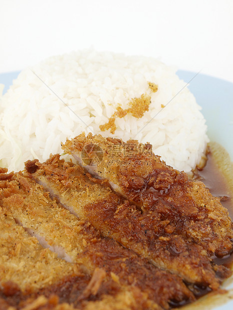 大米和炒猪肉餐厅烹饪盘子油炸食物美食筷子午餐白色图片