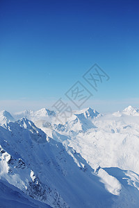 平面顶部风景运动太阳高山岩石蓝色季节爬坡暴风雪冻结图片