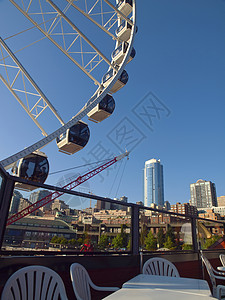 摩天轮和西雅图天线起重机桌子城市边框隔间建筑物高架玻璃观光椅子图片