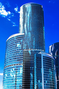 现代摩天大楼总部财产反射市中心蓝色商业城市金融建造中心图片