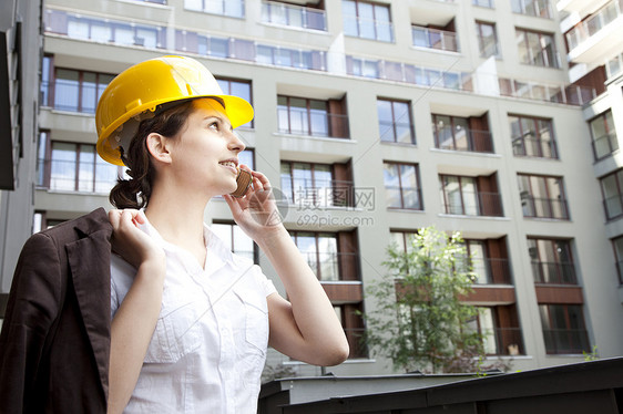 年轻女性有电话的建筑工程青年职场工程师商务职业专家商业承包商经理工人女士图片