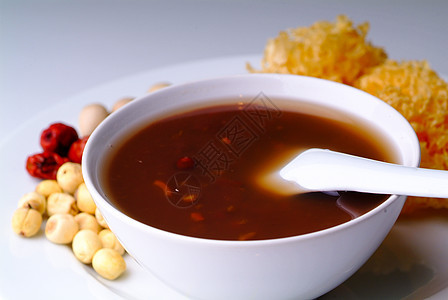 红豆汤 亚洲甜点勺子美食稀饭宏观味道糖浆玉米饮食盘子餐厅图片