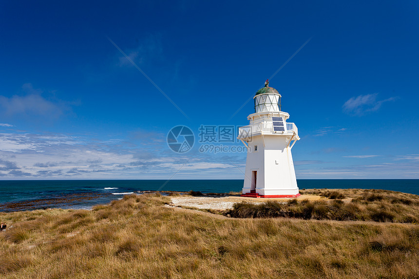 美丽的怀帕帕角灯塔女猫王NZ安全灯塔地标建筑海岸遗产导航旅行房子沿海图片