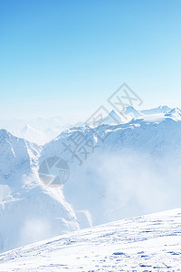 平面顶部太阳阳光旅游单板暴风雪蓝色运动滑雪天空冰川图片