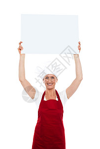将广告板套在头上的厨师图片