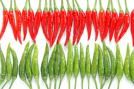 红辣椒和绿辣椒饮食植物白色红色食物团队胡椒香料烹饪水果图片