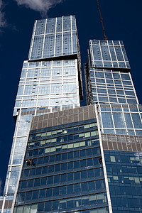 摩天大楼太阳总部晴天民众天空商业公司窗户城市蓝色图片