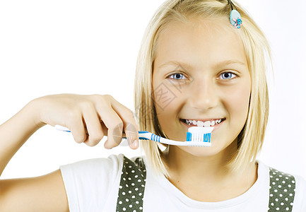 健康的牙牙 小女孩刷牙的牙科情绪卫生女性刷子牙刷孩子女士牙膏金发背景图片