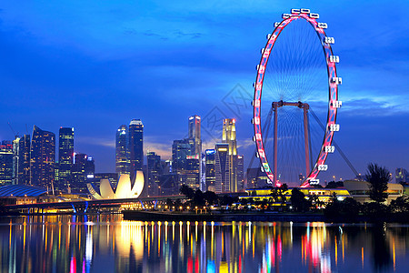 新加坡夜间城市市中心摩天大楼天际生活场景旅游鱼尾狮反射建造图片