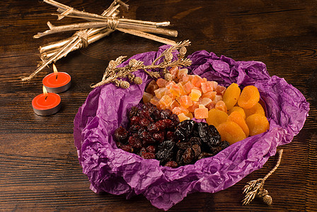 各种干果蜡烛食物水平橙子葡萄干木瓜李子季节性图片