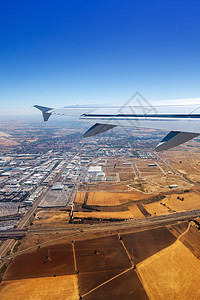 飞机从西班牙马德里巴拉哈斯起飞蓝色引擎运输天空假期航班天堂太阳飞机场天气图片