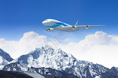 高山上空的白色客机假期航班太阳航空地平线风景阳光旅游顶峰高度图片