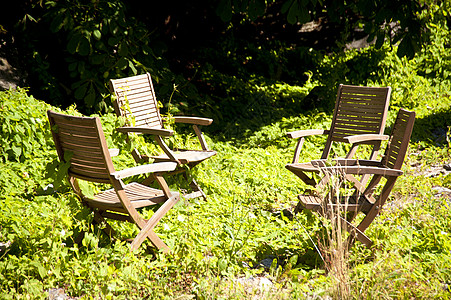花园园花园椅小岛荒野花园绿色椅子家具牧歌背景图片