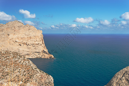西班牙马洛卡海岸的蓝色环礁湖岩石旅行太阳海岸线海洋假期美丽导师侵蚀旅游图片