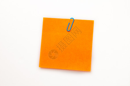 橙色粘贴纸条和纸剪背景图片