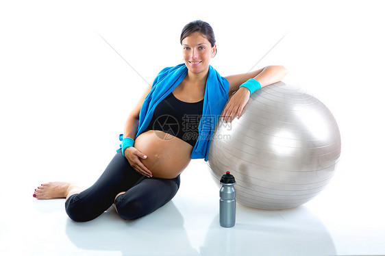 健身健身房的美丽孕妇放松了成人女士肚子母性怀孕瑜伽女性有氧运动妈妈毛巾图片