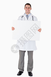 医生拿着一个标志图片