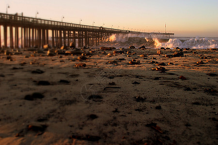 海洋浪潮风暴码头蓝色地平线支撑日出海浪海滩冲浪日落全景海滨图片