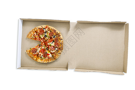 披萨盒中比萨饼的顶部视图图片