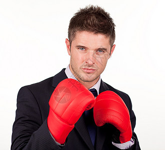 身戴拳手套的商务人士男人运动商务套装竞赛成功拳击手导演经理人士图片