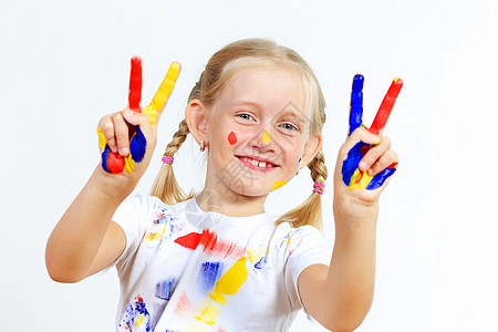 手上涂着油漆的幸福的孩子指纹女孩画家手指喜悦幼儿园艺术品童年绘画创造力图片