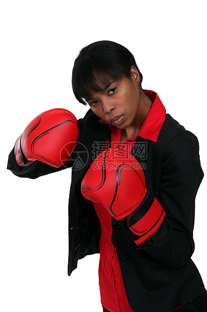 身戴拳手套的女商务人士竞赛商务竞争生意人女孩盒子公司力量商业女士图片