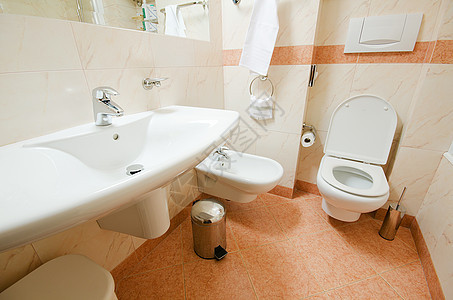 现代洗手间中的厕所浴室酒店装饰座位卫生间收藏房子民众房间奢华图片