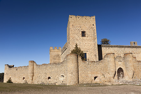 西班牙塞戈维亚 卡斯蒂利亚和里昂佩德拉萨城堡村庄墙壁旅游旅行石头入口历史建筑学晴天图片