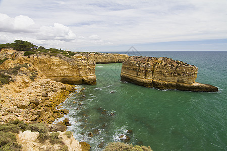 阿尔布费拉 阿尔加尔夫海浪岩石天空海岸地平线悬崖旅行支撑海岸线海滩图片